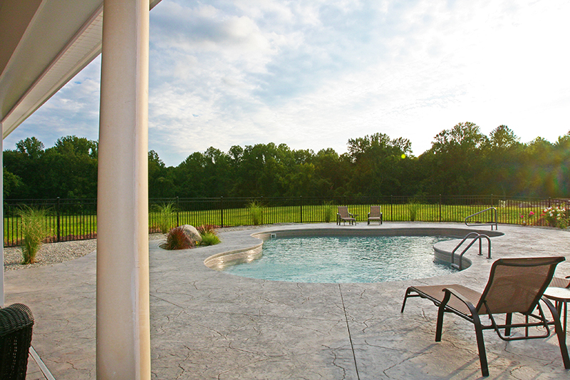 Swimming pool and stamped concrete project example 176